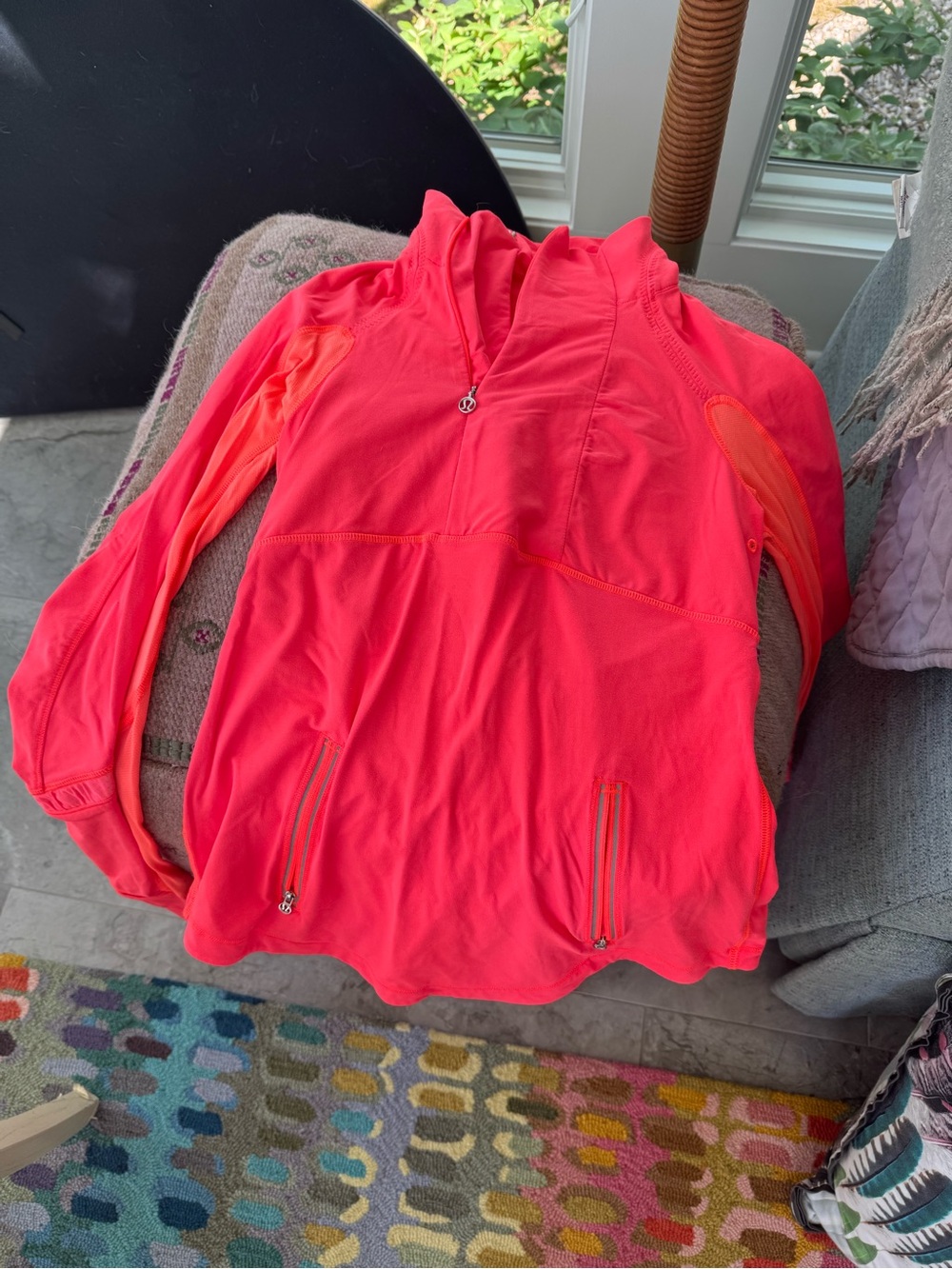 Lulu pullover with front zip pockets.  Like new
